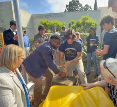  Dr Shelton and Principal Cruce help unearth Samohi time capsule