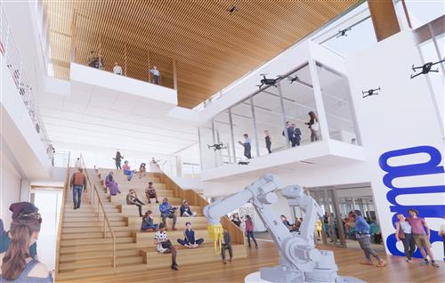 A potential view of a new classroom building showing a pitch space and collaboration areas 