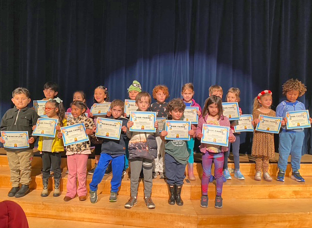 WRLC students holding certificates
