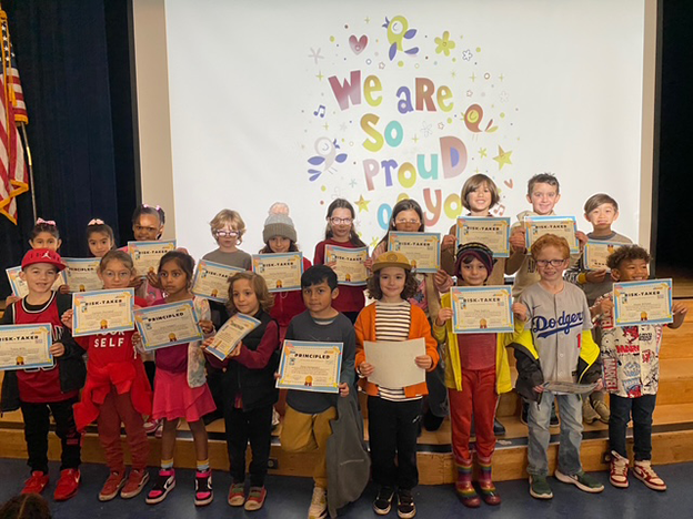 WRLC students holding certificates