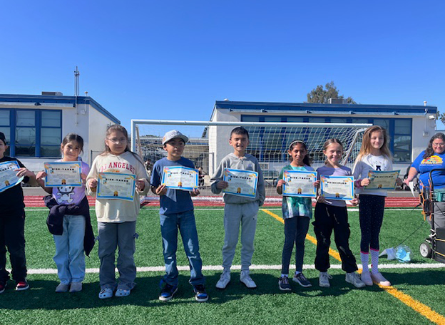WRLC students holding certificates